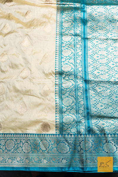 Advika- Off White- Turquoise Blue Banarasi Katan Silk Handwoven Saree