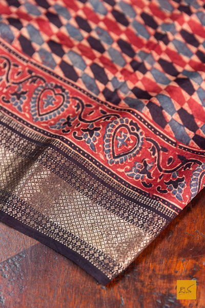 Vaidehi- Brick Red Maheshwari Mulberry Silk Ajrakh Print Handwoven Saree