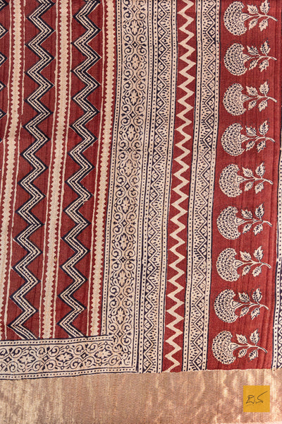Nimeshika- Brick Red Maheshwari Tussar Silk Ajrakh Print Handwoven Saree