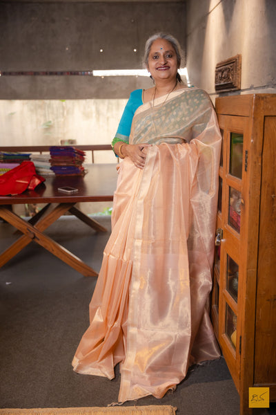 Padmavathi- Peach Tissue Maheshwari Silk Cotton Handwoven Saree