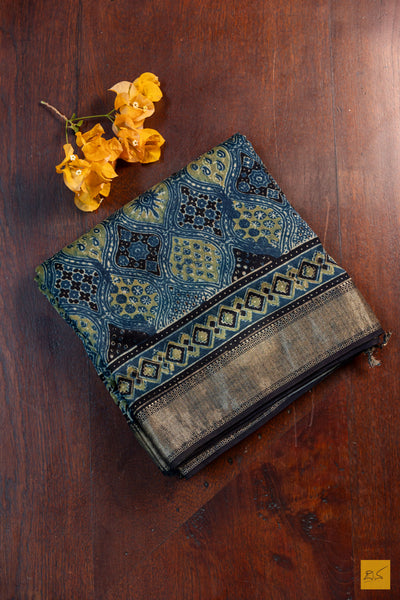 Madhuvanthi- Blue Maheshwari Silk Cotton Ajrakh Print Handwoven Saree