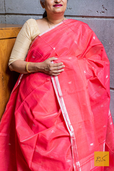 Expertly handwoven from a blend of silk and cotton, this Rose-Pink Maheshwari saree is a stunning piece of craftsmanship. The delicate rose-pink color and intricate design make it a perfect choice for any occasion.