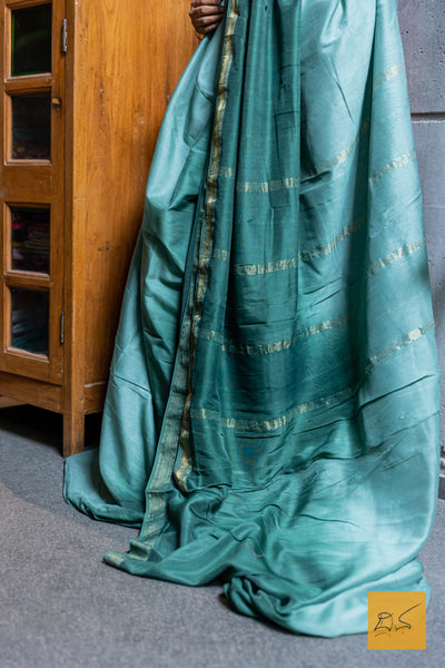 Master the art of elegance with our Green Ombre Maheshwari Silk Cotton Handwoven Saree. Made from the finest silk cotton blend, each saree is handwoven to perfection, creating a beautiful ombre effect