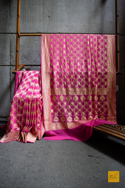 A soothing pink banarasi saree in georgette. perfect for a wedding and festivities too. what say? Presenting a georgette banarasi saree in chequered jaal pattern with woven elephant motifs.