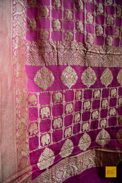 A soothing pink banarasi saree in georgette. perfect for a wedding and festivities too. what say? Presenting a georgette banarasi saree in chequered jaal pattern with woven elephant motifs.
