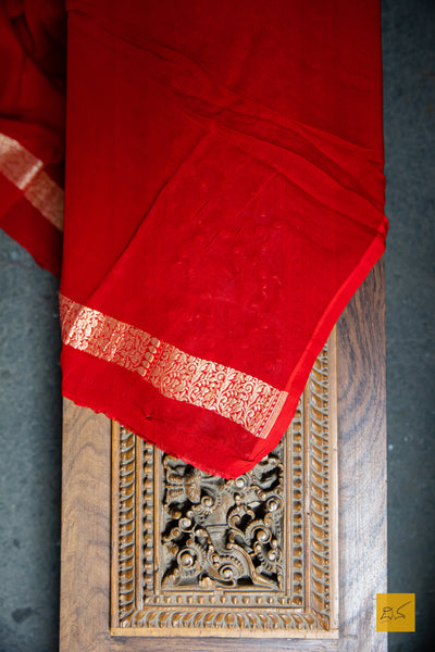 As the name suggests, it will be your loved one.  A banarasi georgette saree in red colour with bandhej. A saree apt for the upcoming weddings and festivals. 