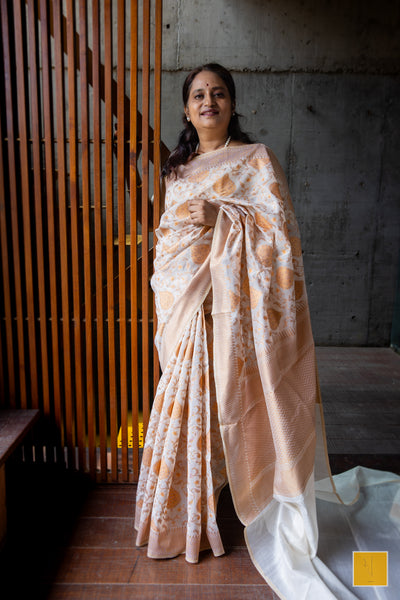 This is a beautiful Off white banarasi cotton handwoven saree. Traditional yet contemporary in it's look. Indian wedding, festivals, handwoven saree for classical music singers, dancers, architects, saree connoisseurs, saree collectors, brides, bridesmaids.