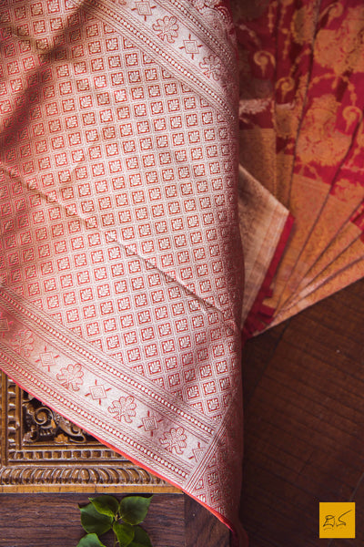 This is a beautiful katan silk banarasi sari with a red body and a unique zari jaal. New trend of Banarasi Saree designs, Banarasi Saree for artists, art lovers, architects, saree lovers, Saree connoisseurs, musicians, dancers, doctors, Banarasi Katan silk saree, indian saree images, latest sarees with price, only saree images, new Banarasi saree design.