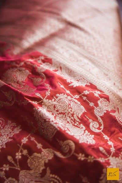 This is a beautiful katan silk banarasi sari with a red body and a unique zari jaal. New trend of Banarasi Saree designs, Banarasi Saree for artists, art lovers, architects, saree lovers, Saree connoisseurs, musicians, dancers, doctors, Banarasi Katan silk saree, indian saree images, latest sarees with price, only saree images, new Banarasi saree design.