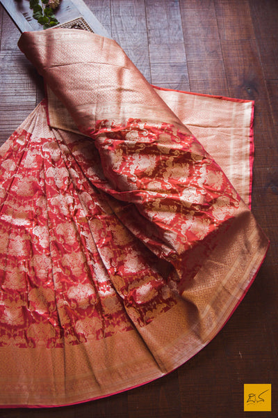 This is a beautiful katan silk banarasi sari with a red body and a unique zari jaal. New trend of Banarasi Saree designs, Banarasi Saree for artists, art lovers, architects, saree lovers, Saree connoisseurs, musicians, dancers, doctors, Banarasi Katan silk saree, indian saree images, latest sarees with price, only saree images, new Banarasi saree design.