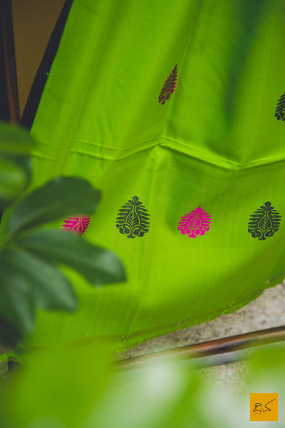 This morning is full of excitement looking at the parrots flying and chirping happily. I too want to fly like a happy parrot and experience the world. Presenting this parrot green pure satin silk handwoven dupatta with thread woven kadhwa buttas.