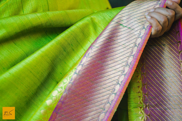 This is a gorgeous Banarasi silk handwoven Saree where the pink part has beautifully woven mango pattern zari work and it is in pure silk. The plain green part is of tussar silk. The blouse is in pink with woven border. New trend of Banarasi Saree designs, Banarasi Saree for artists, art lovers, architects, saree lovers, Saree connoisseurs, musicians, dancers, doctors, Banarasi silk saree, indian saree images, latest sarees with price, only saree images, new Banarasi saree design.