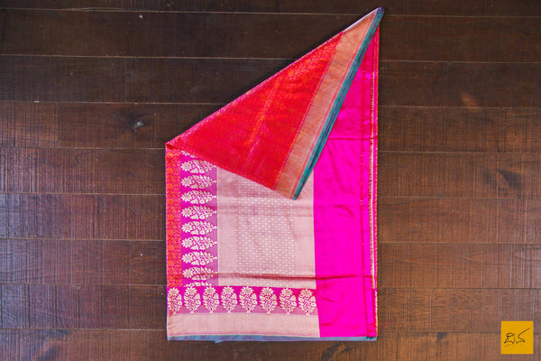 This is a gorgeous Banarasi silk Saree with pink body and has orange tanchoi work and the border has woven moghul motifs in kadhwa style. The blouse has intricately woven zari brocade work. New trend of Banarasi Saree designs, Banarasi Saree for artists, art lovers, architects, saree lovers, Saree connoisseurs, musicians, dancers, doctors, Banarasi silk saree, indian saree images, latest sarees with price, only saree images, new Banarasi saree design.