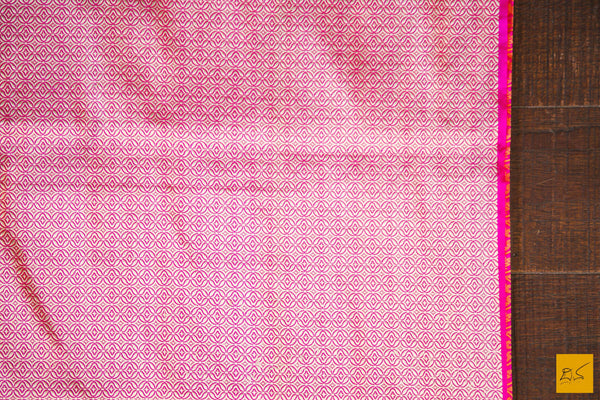 This is a gorgeous Banarasi silk Saree with pink body and has orange tanchoi work and the border has woven moghul motifs in kadhwa style. The blouse has intricately woven zari brocade work. New trend of Banarasi Saree designs, Banarasi Saree for artists, art lovers, architects, saree lovers, Saree connoisseurs, musicians, dancers, doctors, Banarasi silk saree, indian saree images, latest sarees with price, only saree images, new Banarasi saree design.