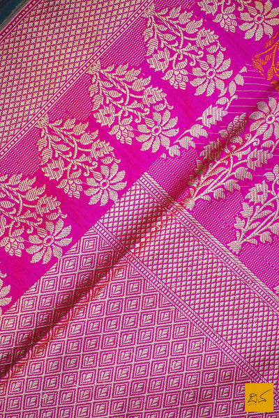 This is a gorgeous Banarasi silk Saree with pink body and has orange tanchoi work and the border has woven moghul motifs in kadhwa style. The blouse has intricately woven zari brocade work. New trend of Banarasi Saree designs, Banarasi Saree for artists, art lovers, architects, saree lovers, Saree connoisseurs, musicians, dancers, doctors, Banarasi silk saree, indian saree images, latest sarees with price, only saree images, new Banarasi saree design.