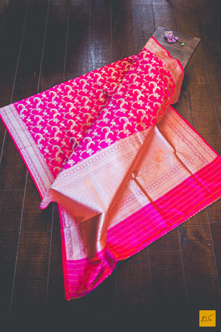 This wonderful Banarasi Katan Silk Saree has a body in pink colour. New trend of Banarasi Saree designs, Banarasi Saree for artists, art lovers, architects, saree lovers, Saree connoisseurs, musicians, dancers, doctors, Banarasi silk saree, indian saree images, latest sarees with price, only saree images, new Banarasi saree design.