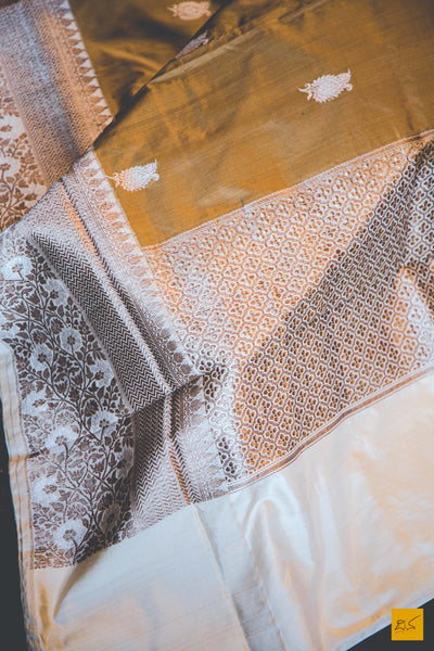 A beautiful katan silk banarasi handwoven sari with a brown body. New trend of Banarasi Saree designs, Banarasi Saree for artists, art lovers, architects, saree lovers, Saree connoisseurs, musicians, dancers, doctors, Banarasi Katan silk saree, indian saree images, latest sarees with price, only saree images, new Banarasi saree design.