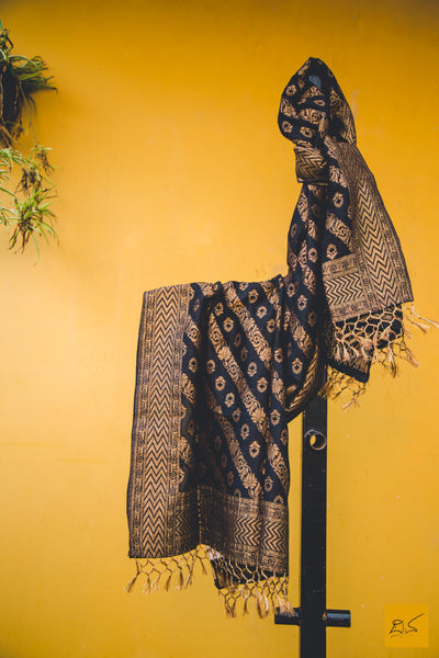 Wearing black is a lifestyle.  A munga silk banarasi stole.  Length - 2.25 m  Width - 22.5 in