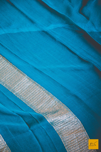 This wonderful Banarasi Georgette Saree consists of shades of Blue in this body. New trend of Banarasi Saree designs, Banarasi Saree for artists, art lovers, architects, saree lovers, Saree connoisseurs, musicians, dancers, doctors, Banarasi silk saree, indian saree images, latest sarees with price, only saree images, new Banarasi saree design.