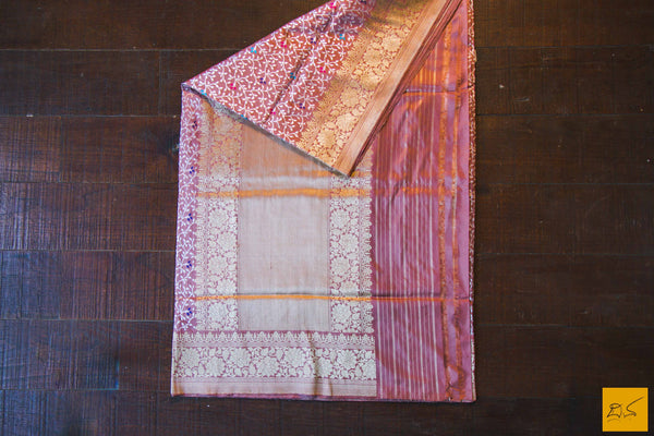 This is a gorgeous Banarasi Handwoven Silk Saree withmeena patola all over the body. The saree has a golden phulkari border. The meena work is so exquisite that it makes the saree adorable. The blouse is of rose pink colour with border. New trend of Banarasi Saree designs, Banarasi Saree for artists, art lovers, architects, saree lovers, Saree connoisseurs, musicians, dancers, doctors, Banarasi silk saree, indian saree images, latest sarees with price, only saree images, new Banarasi saree design.