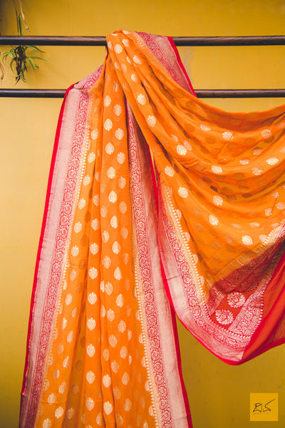 This is a wonderful orange and red banarasi georgette dupatta. New trend of Banarasi dupatta designs, Banarasi dupatta for artists, art lovers, architects, dupatta lovers, dupatta connoisseurs, musicians, dancers, doctors, Banarasi Katan silk dupatta, indian dupatta images, latest dupattas with price, only dupatta images, new Banarasi dupatta design.
