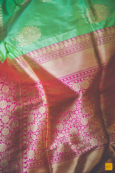 This is a beautiful katan silk banarasi sari with a pink border and kadhwa motifs. It's speciality is its Kadhiyal border. It is dyed and woven with different colour which makes it the authentic Kadhiyal. New trend of Banarasi Saree designs, Banarasi Saree for artists, art lovers, architects, saree lovers, Saree connoisseurs, musicians, dancers, doctors, Banarasi Katan silk saree, indian saree images, latest sarees with price, only saree images, new Banarasi saree design.