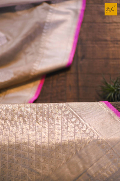 A magnificent banarasi tussar silk handwoven sari with sona and rupa traditional moghul notice woven in kadhwa motifs and pink slevegde. The blouse has woven zari stripes with the border New trend of Banarasi Saree designs, Banarasi Saree for artists, art lovers, architects, saree lovers, Saree connoisseurs, musicians, dancers, doctors, Banarasi Katan silk saree, indian saree images, latest sarees with price, only saree images, new Banarasi saree design.