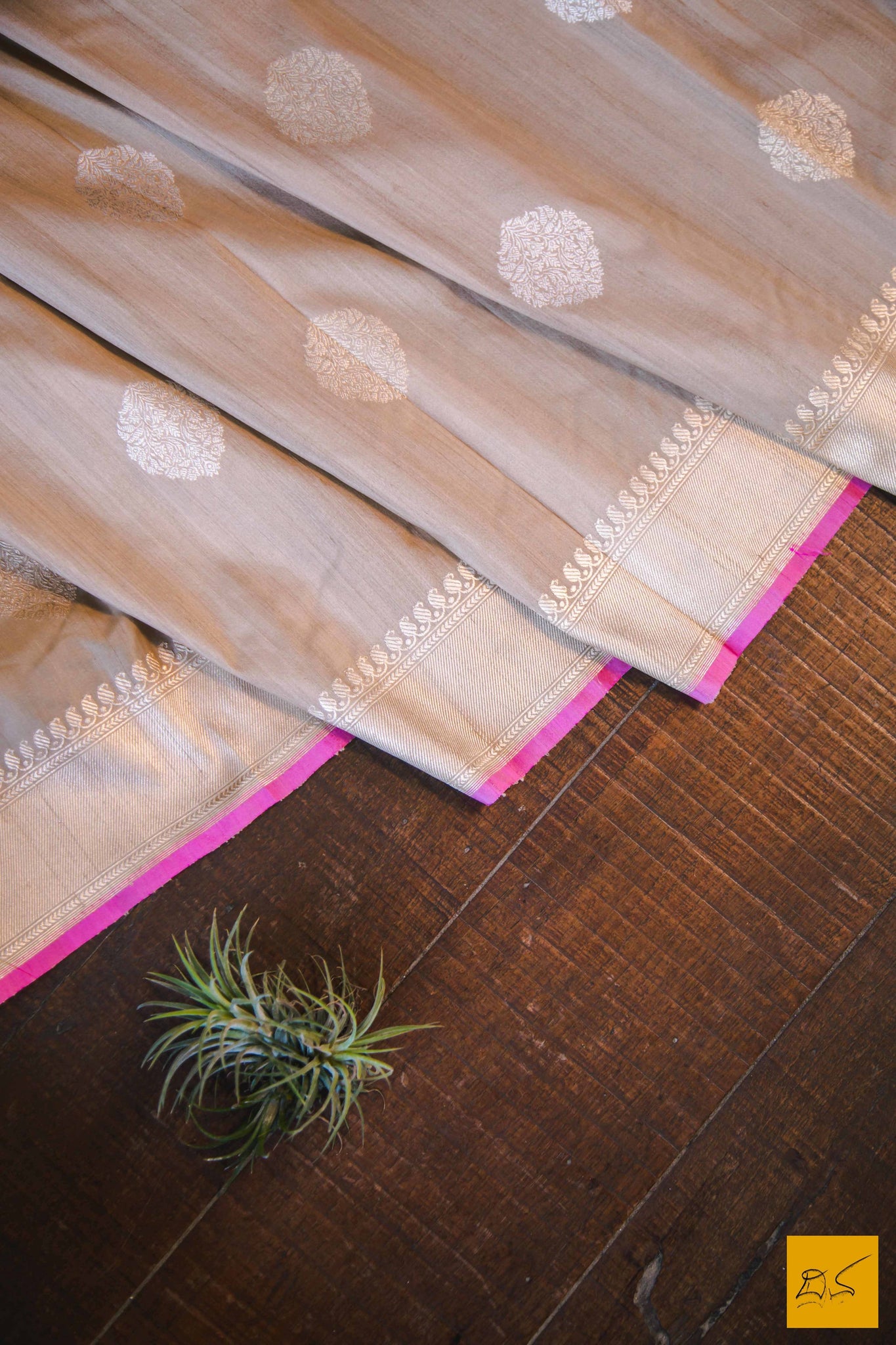 A magnificent banarasi tussar silk handwoven sari with sona and rupa traditional moghul notice woven in kadhwa motifs and pink slevegde. The blouse has woven zari stripes with the border New trend of Banarasi Saree designs, Banarasi Saree for artists, art lovers, architects, saree lovers, Saree connoisseurs, musicians, dancers, doctors, Banarasi Katan silk saree, indian saree images, latest sarees with price, only saree images, new Banarasi saree design.