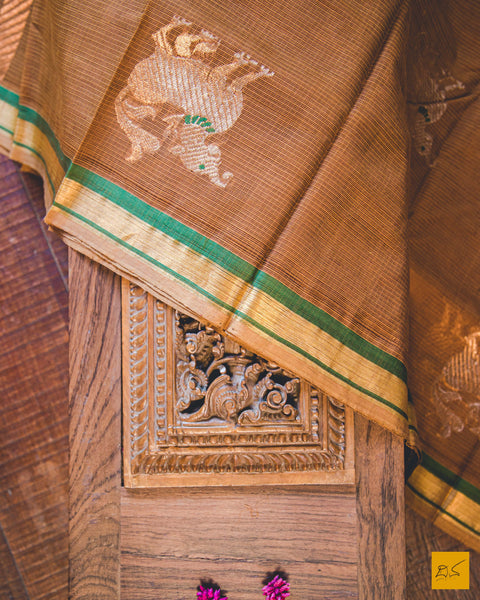 Brown yaali real zari silk kota handwoven saree which is great for both formal and informal gatherings, pair it with minimalistic jewellery