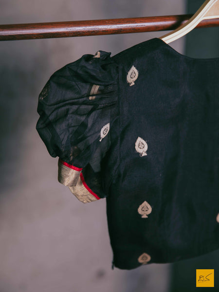 An all-rounder silk cotton black blouse with buttas and hints of red. New trend of Blouse designs, Blouse for artists, art lovers, architects, blouse lovers, Blouse connoisseurs, musicians, dancers, doctors, Brocade blouse, indian blouse images, latest blouses with price, only blouse images, new blouse design.
