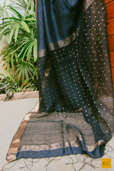 This is a gorgeous Matka silk handwoven saree with plain body in Black and woven sequin pallu. New trend of matka Silk saree designs, matka Silk saree for artists, art lovers, architects, saree lovers, saree connoisseurs, musicians, dancers, doctors, matka Silk saree, indian saree images, latest sarees with price, only saree images, new matka silk saree design.