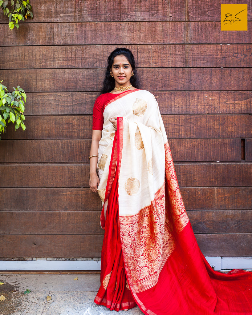 This is a gorgeous Banarasi Dupion Silk Saree with kadhwa buttas in half and half style. New trend of Banarasi Saree designs, Banarasi Saree for artists, art lovers, architects, saree lovers, Saree connoisseurs, musicians, dancers, doctors, Banarasi silk saree, indian saree images, latest sarees with price, only saree images, new Banarasi saree design.