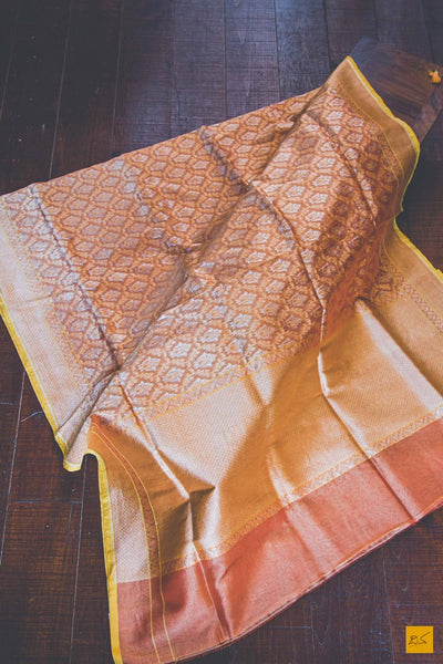 A lovely banarasi cotton tissue sari with a honey orange body and yellow selvedge. New trend of Banarasi Saree designs, Banarasi Saree for artists, art lovers, architects, saree lovers, Saree connoisseurs, musicians, dancers, doctors, Banarasi Katan silk saree, indian saree images, latest sarees with price, only saree images, new Banarasi saree design.