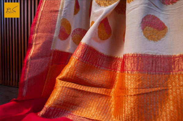This is a gorgeous Banarasi munga silk Saree with brush dyed buttas and contrast red blouse. New trend of Banarasi Saree designs, Banarasi Saree for artists, art lovers, architects, saree lovers, Saree connoisseurs, musicians, dancers, doctors, Banarasi silk saree, indian saree images, latest sarees with price, only saree images, new Banarasi saree design.