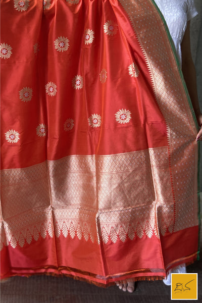 This is a gorgeous an orange-red banarasi katan silk handwoven dupatta with sona rupa buttas. New trend of Silk Dupatta designs, Silk Dupatta for artists, art lovers, architects, dupatta lovers, Dupatta connoisseurs, musicians, dancers, doctors, Silk dupatta, indian dupatta images, latest dupattas with price, only dupatta images, new Silk dupatta design.