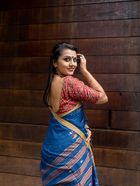 A super soft handspun cotton saree with handwoven jamdani weave. This saree is perfect to be comfortably worn for the whole day.   Fabric- Cotton Colour- Blue Length- 6.5m