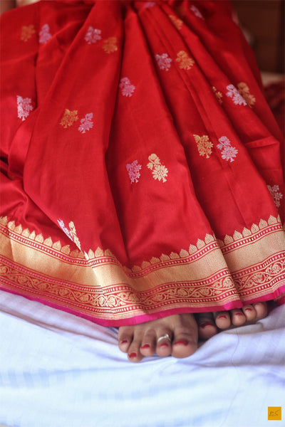 A beautiful katan silk banarasi handwoven sari with a red body and kadhwa sonarupa buttas. New trend of Banarasi Saree designs, Banarasi Saree for artists, art lovers, architects, saree lovers, Saree connoisseurs, musicians, dancers, doctors, Banarasi Katan silk saree, indian saree images, latest sarees with price, only saree images, new Banarasi saree design.