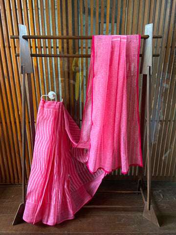 A lovely pink Kota cotton block printed saree with subtle hints of red Kantha work. New trend of Saree designs, Saree for artists, art lovers, architects, saree lovers, Saree connoisseurs, musicians, dancers, doctors, silk saree, indian saree images, latest sarees with price, only saree images, new saree design.