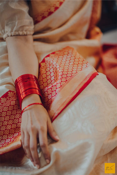 This is a beautiful banarasi katan silk zari tanchoi handwoven sari in gold and off-white banarasi with red contrast. New trend of Banarasi Saree designs, Banarasi Saree for artists, art lovers, architects, saree lovers, Saree connoisseurs, musicians, dancers, doctors, Banarasi Katan silk saree, indian saree images, latest sarees with price, only saree images, new Banarasi saree design.