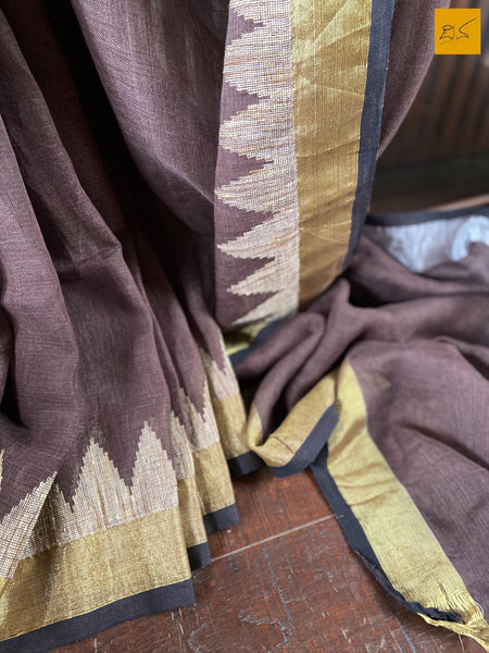 This is a gorgeous Linen handwoven Saree with a brown body. New trend of Saree designs, Saree for artists, art lovers, architects, saree lovers, Saree connoisseurs, musicians, dancers, doctors, linen saree, indian saree images, latest sarees with price, only saree images, new saree design.