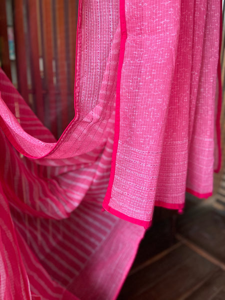 A lovely pink Kota cotton block printed saree with subtle hints of red Kantha work. New trend of Saree designs, Saree for artists, art lovers, architects, saree lovers, Saree connoisseurs, musicians, dancers, doctors, silk saree, indian saree images, latest sarees with price, only saree images, new saree design.